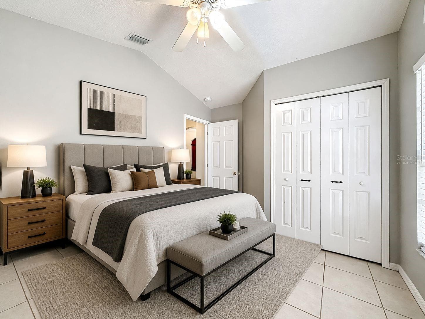Additional secondary bedroom featuring ample closet space and bright windows. (Virtually staged) - 7116 COLONY POINTE DR, RIVERVIEW