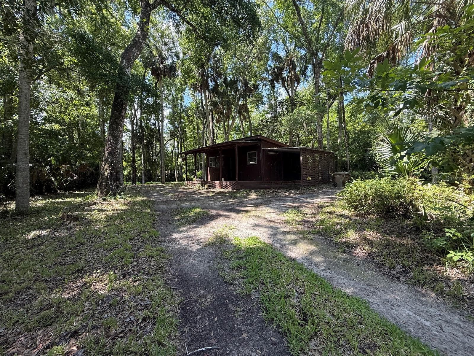 Single Family Residence at 23946 INDIGO RD, ASTOR, photo 2 of 20