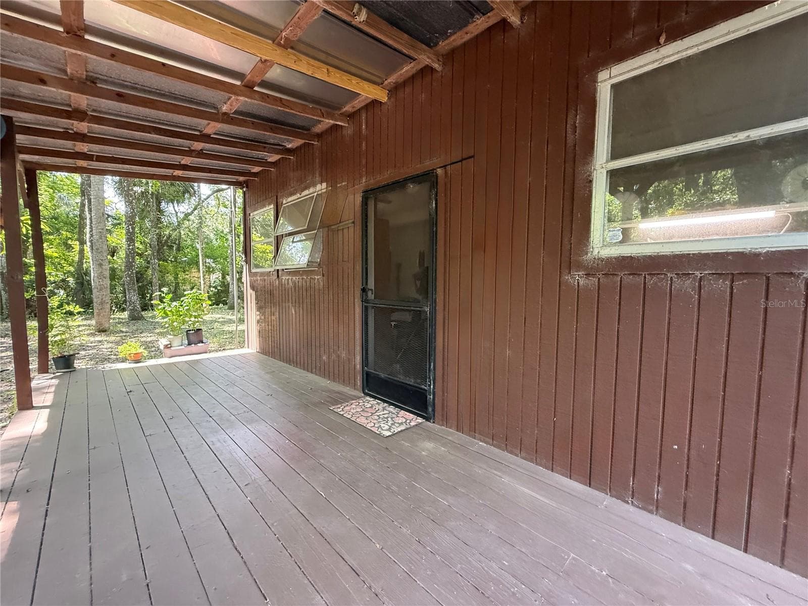 Single Family Residence at 23946 INDIGO RD, ASTOR, photo 4 of 20