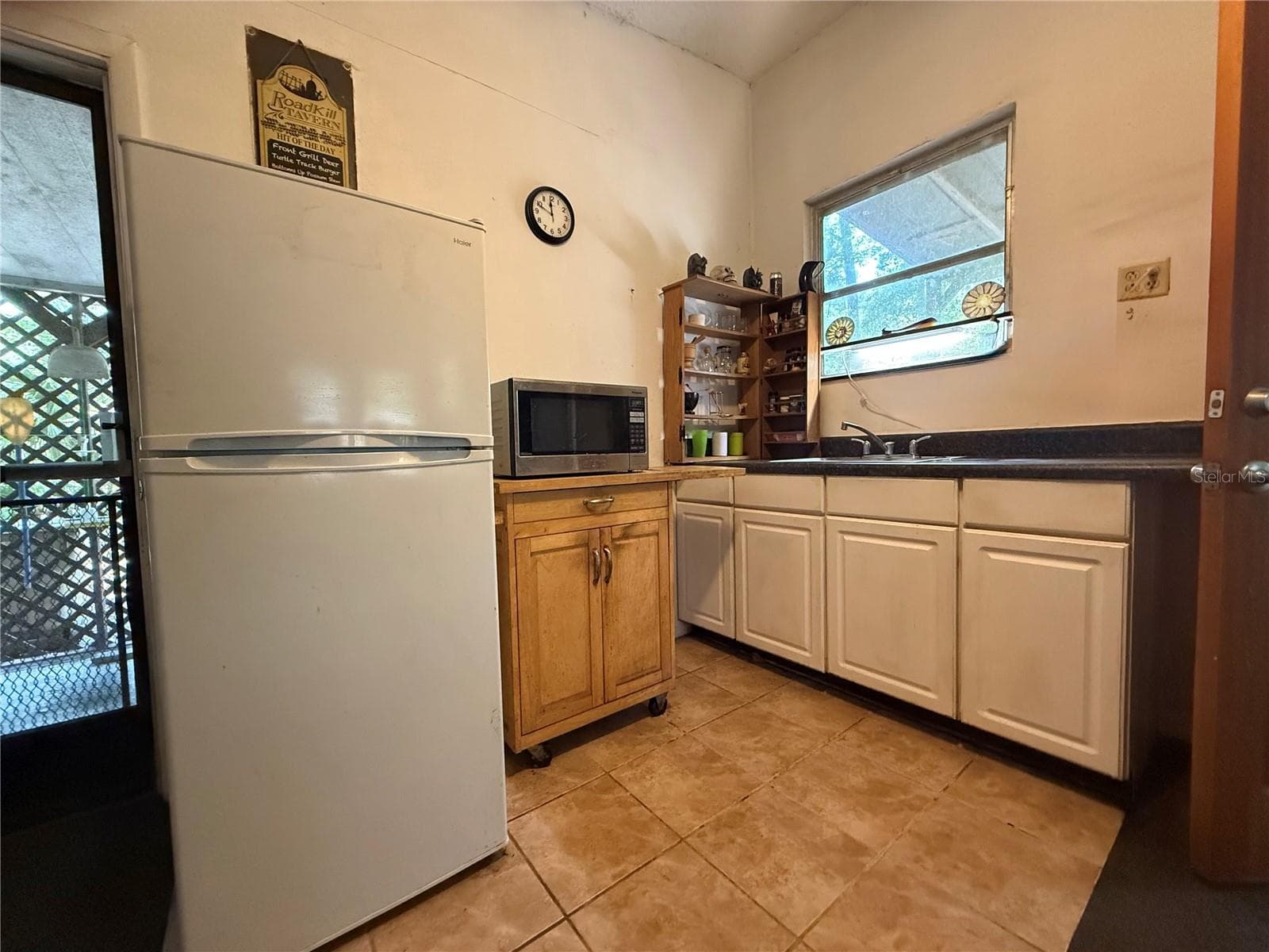 Single Family Residence at 23946 INDIGO RD, ASTOR, photo 9 of 20