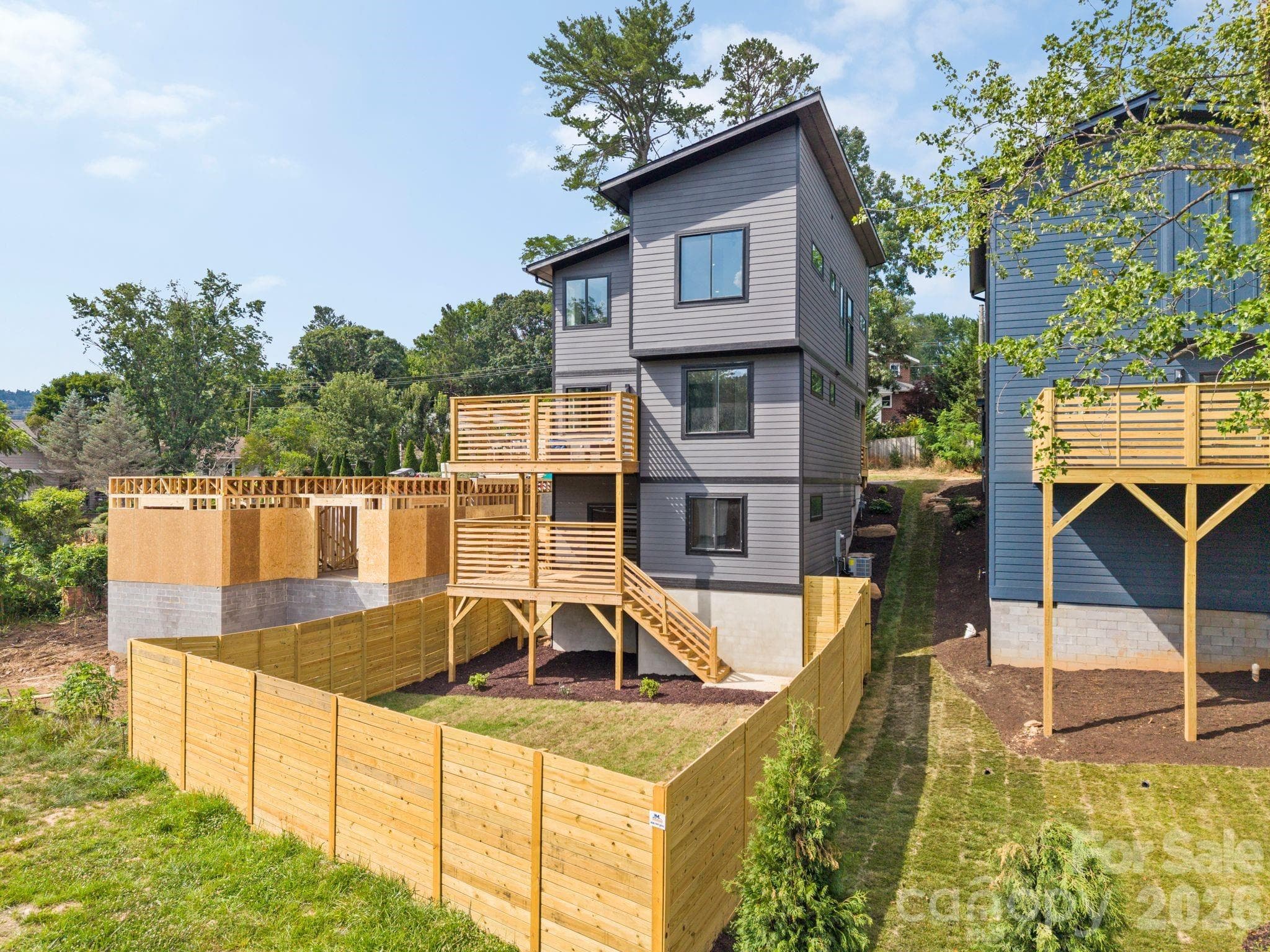 Back exterior + fence - Asheville