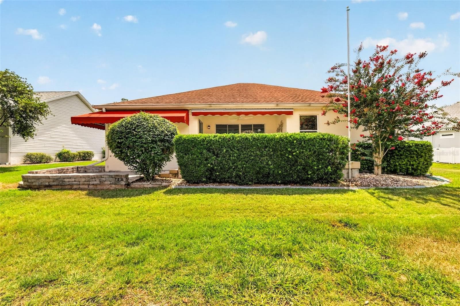 Rear Elevation with PRIVACY Landscaping - 522 LOMA PASEO DR, THE VILLAGES
