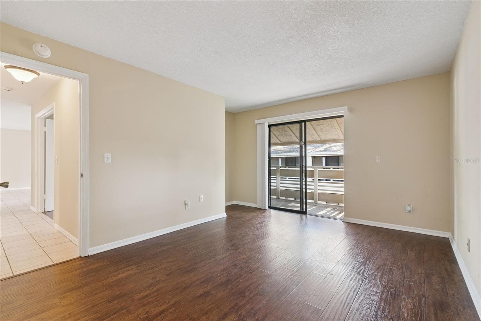 Primary Bedroom has an alcove for desk or chair and access to balcony - 445 S NETHERWOOD CRES #2, ALTAMONTE SPRINGS