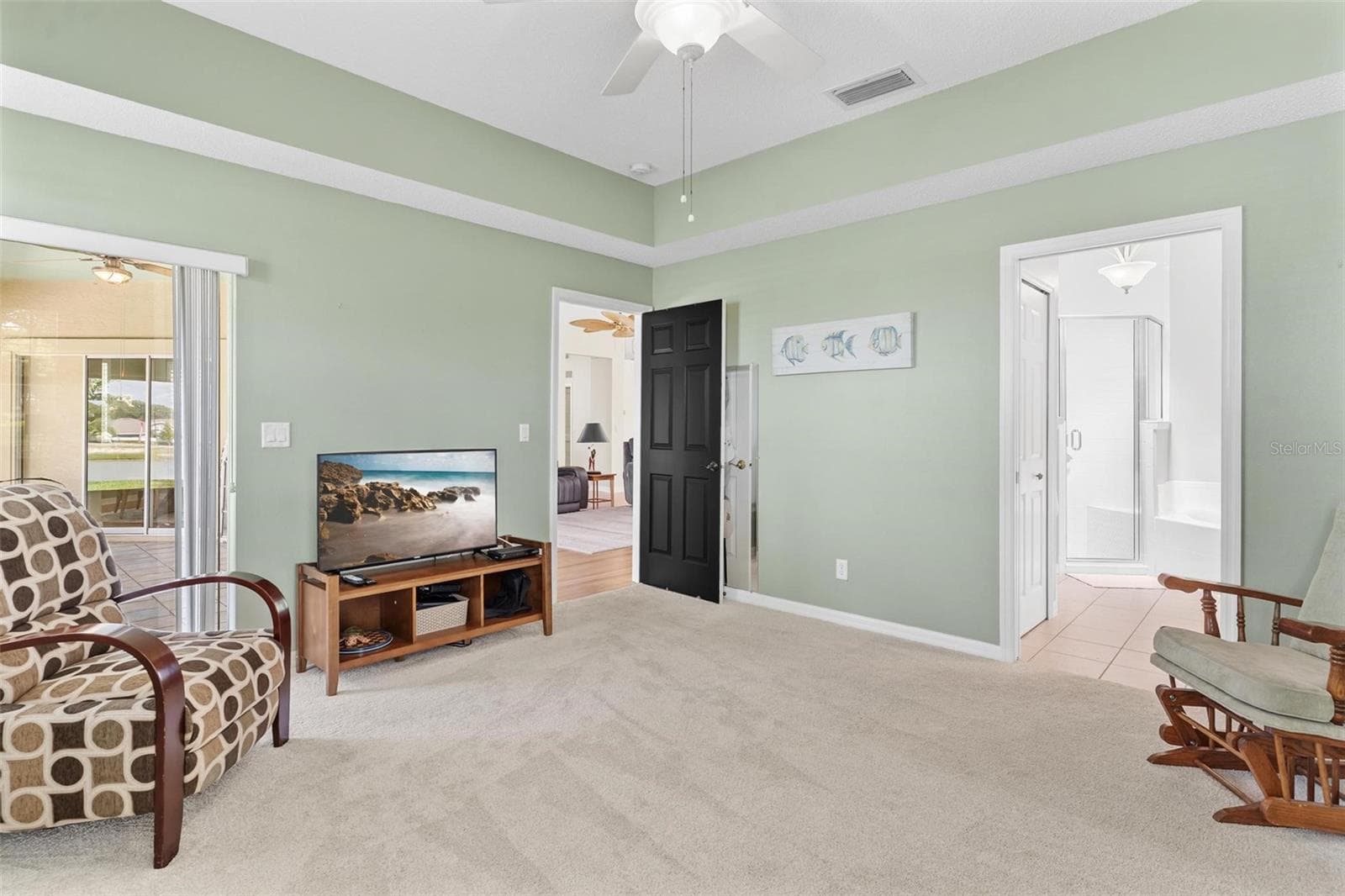 Primary Bedroom, sliders ro Florida Room - 3354 SAINT LUCIA CT, TAVARES