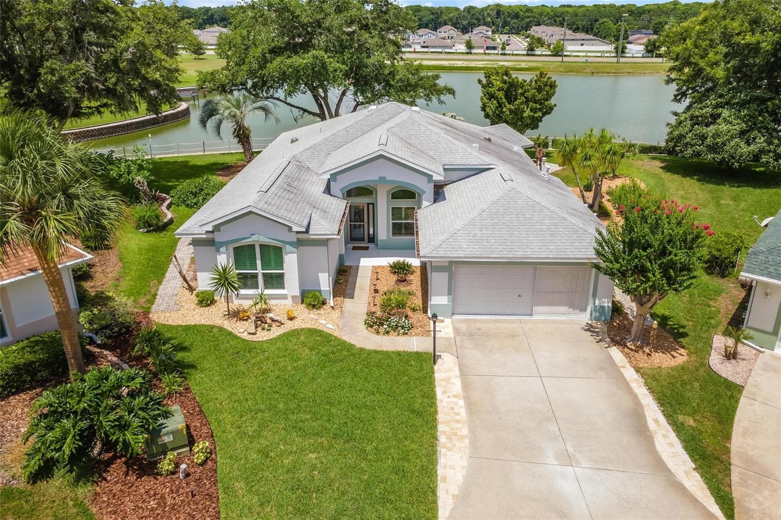Aerial of home overlooking Lake Laemont. - 3354 SAINT LUCIA CT, TAVARES