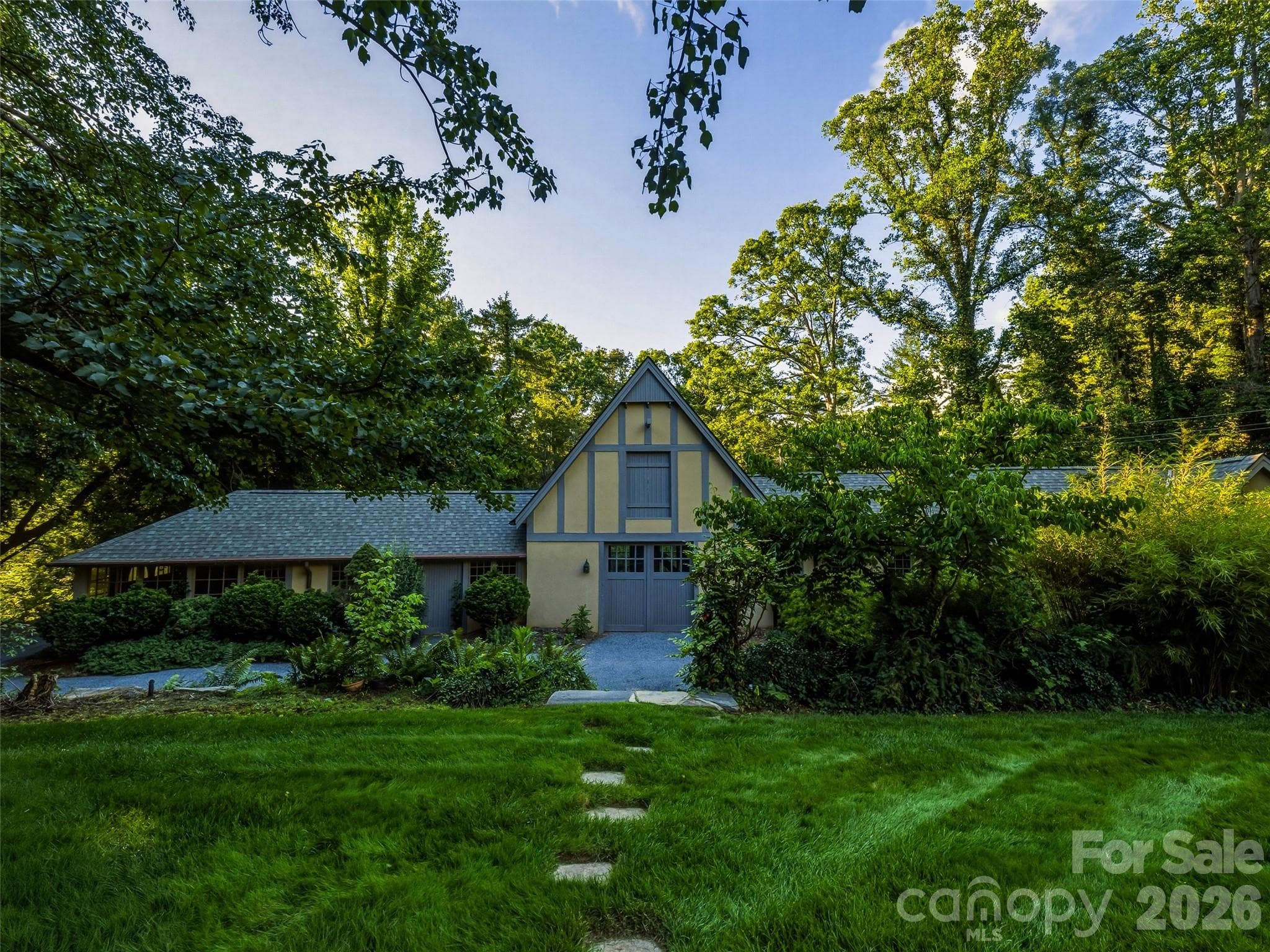 Historic stable with garage space and storage rooms plus one roomw ith HVAc and a basic bath. - Biltmore Forest