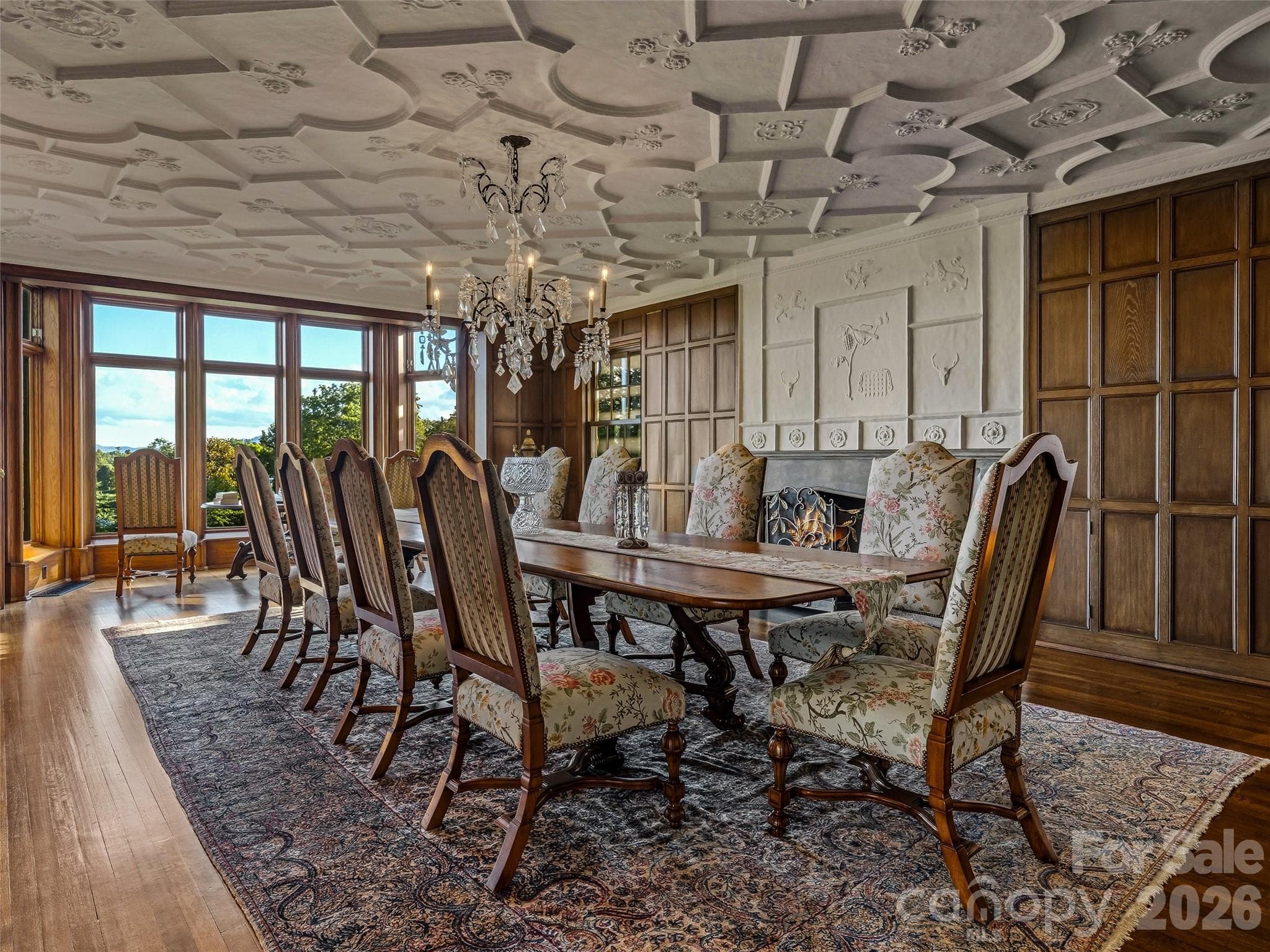 Formal dining room with fireplace and plaster tracery ceiling - Biltmore Forest