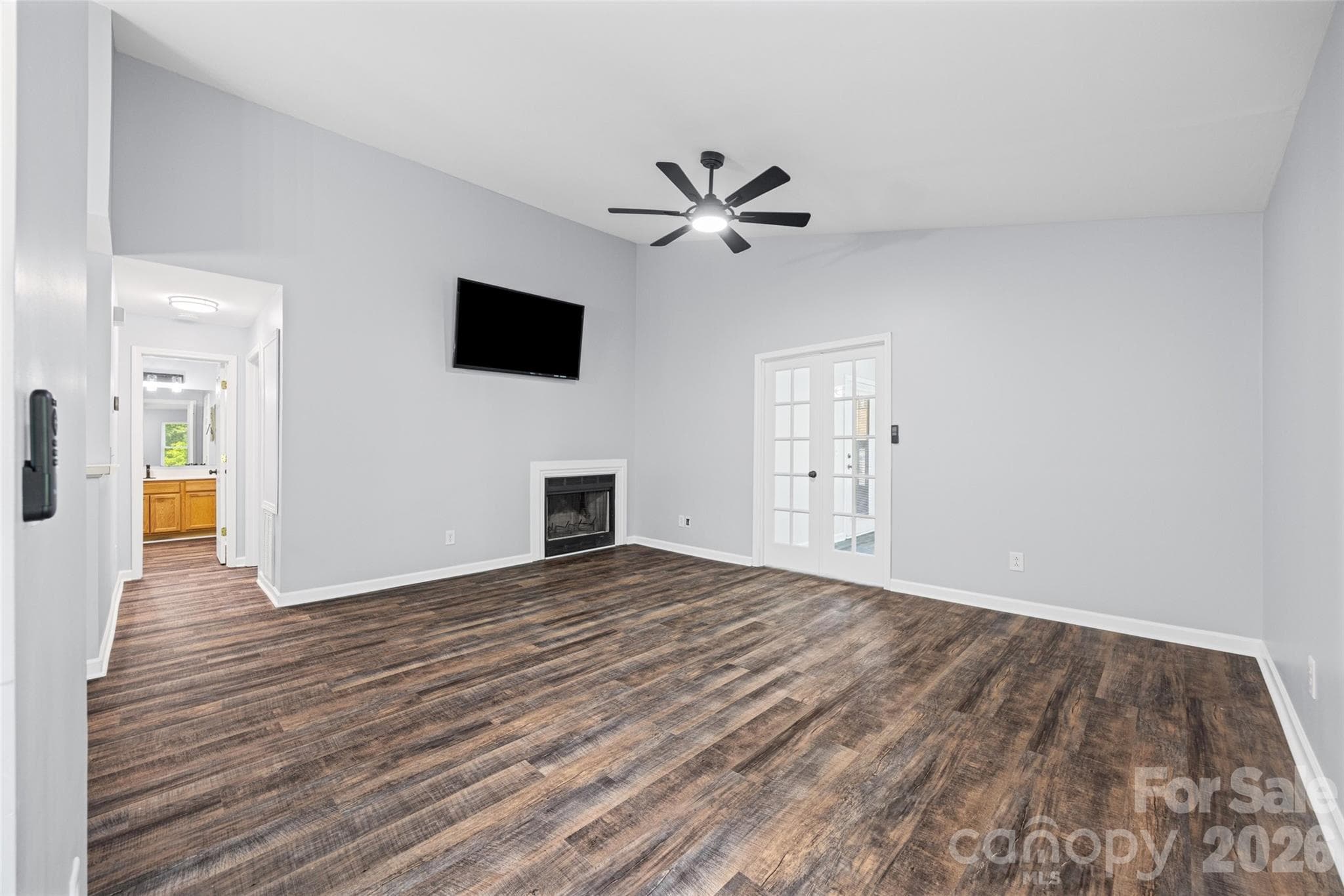 Large Living Room with fireplace - 8119 Tremaine Court, Charlotte