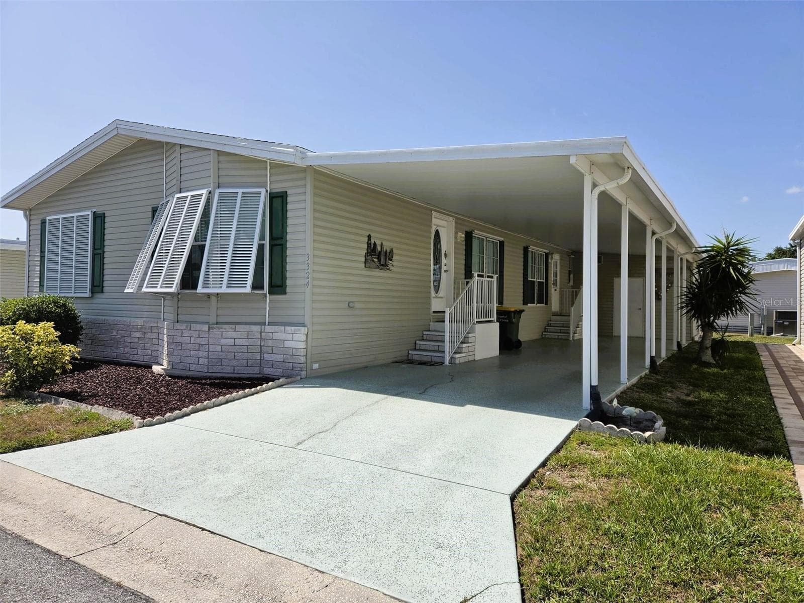 Carport View with 2 entrances to the home - 3324 OVERCUP OAK TER, SARASOTA