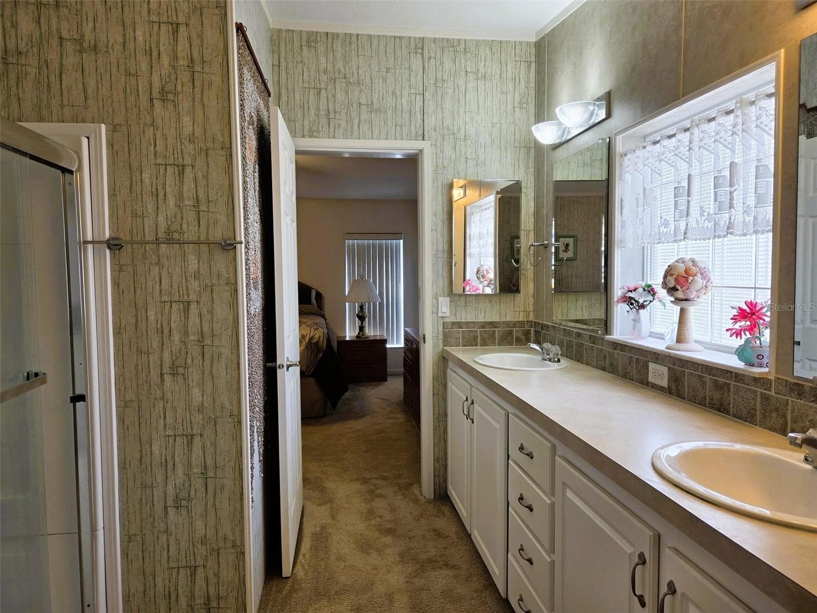 View from Primary Bath into Primary Bedroom - 3324 OVERCUP OAK TER, SARASOTA