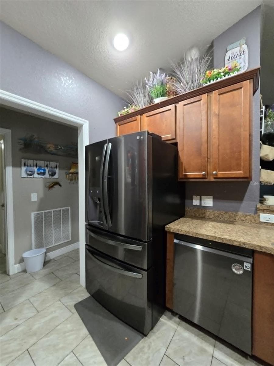 Fridge and Kitchen Area - 1982 WINSLOW LN, NORTH PORT