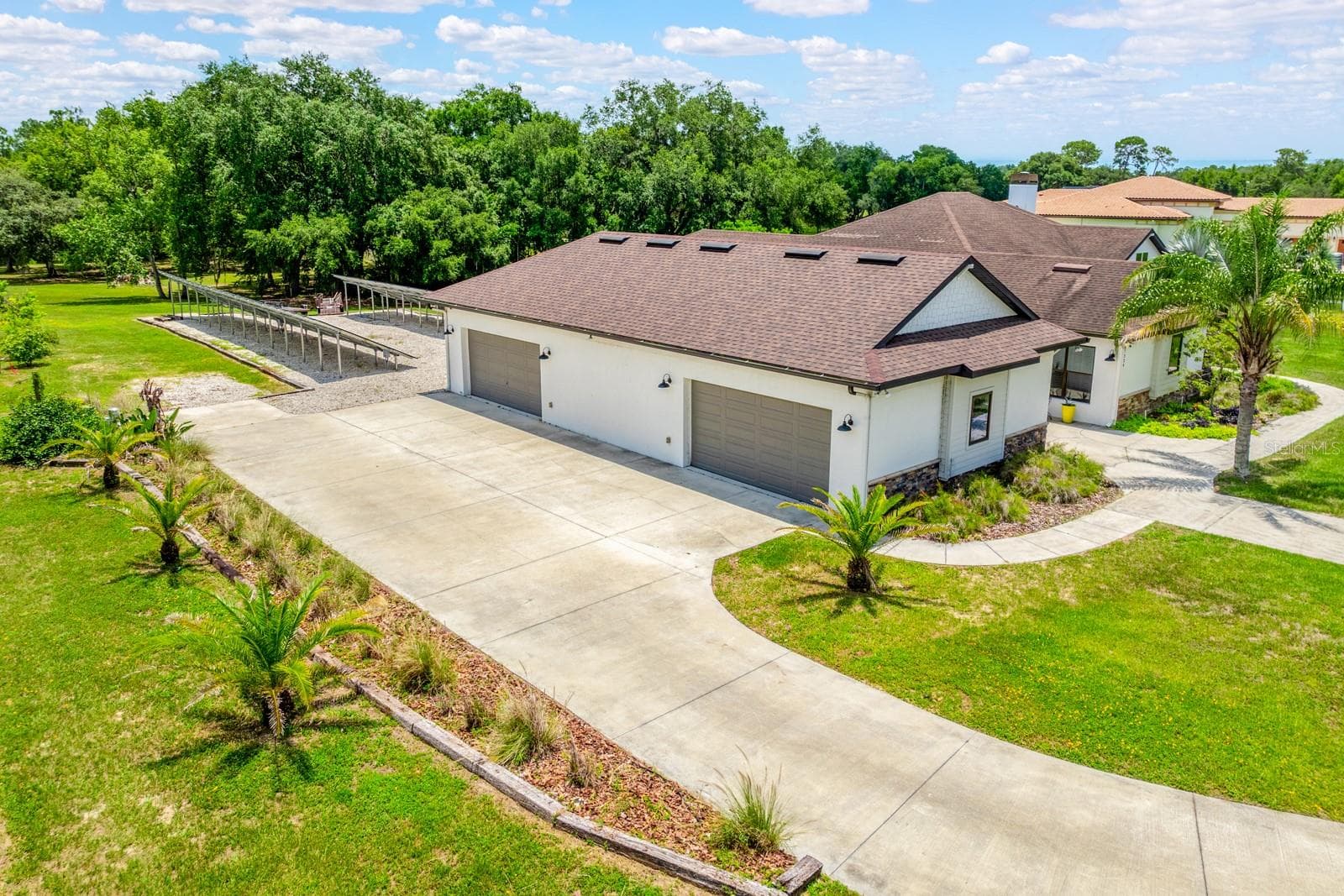 4-car garage! - 27324 GRAND OAK LN, TAVARES