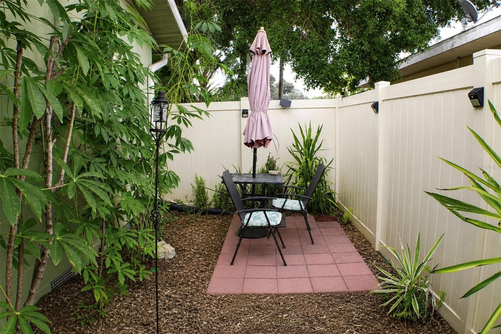 Secluded Patio - 1405 28TH ST NW, WINTER HAVEN