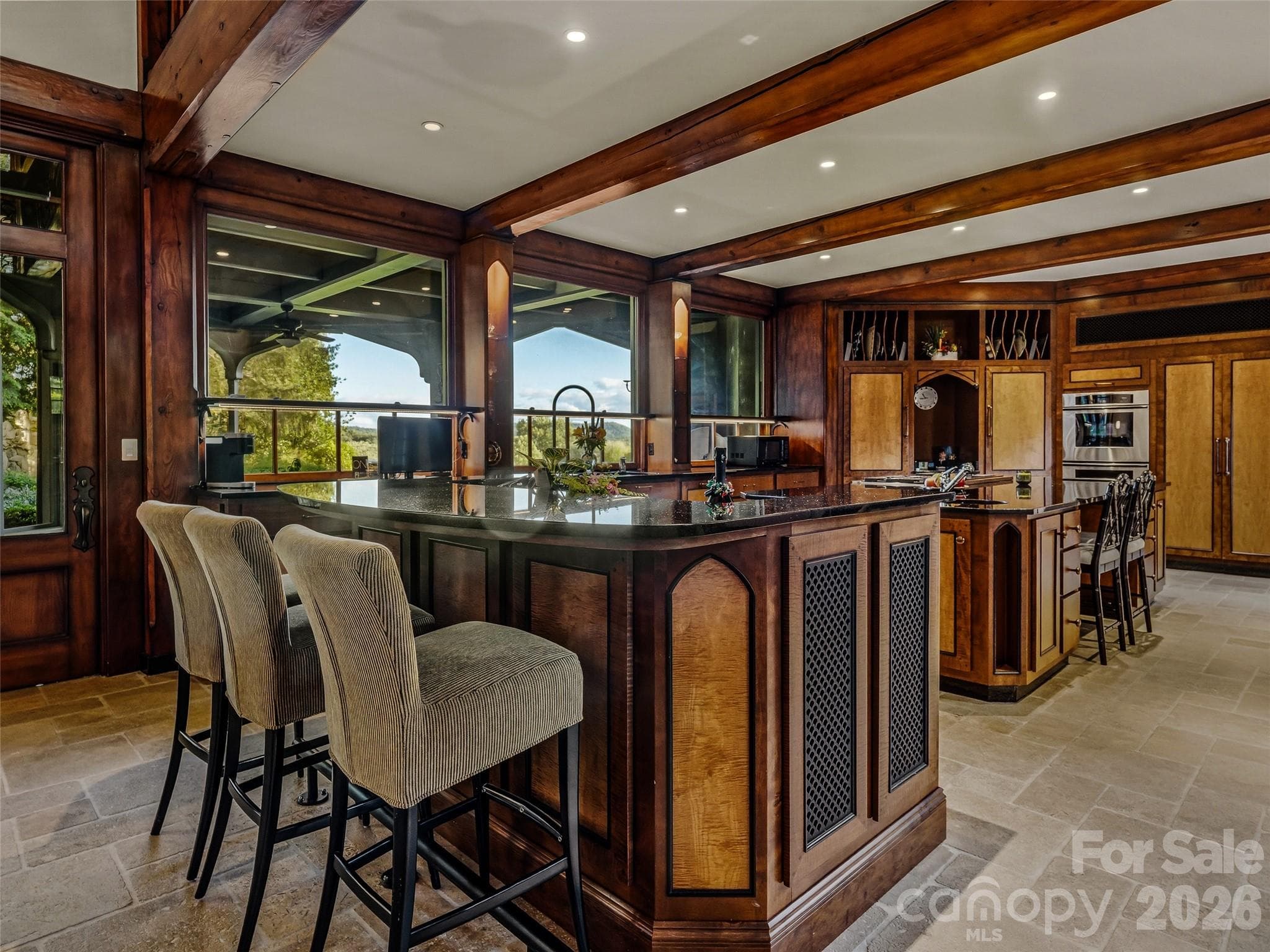 Custom cabinetry in a Biedermeier style commensurate with the architecture. - Biltmore Forest