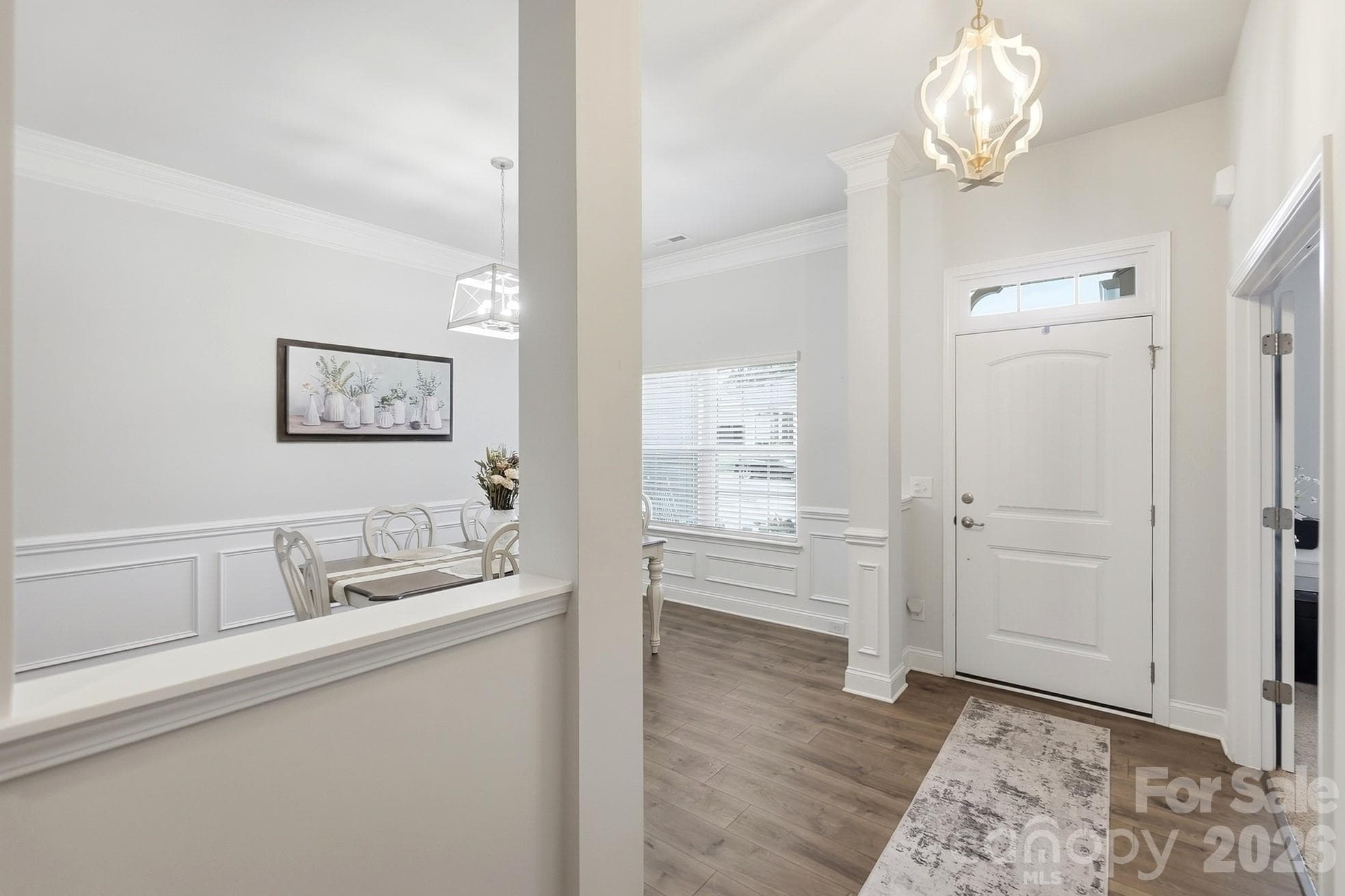 Bright entry foyer with an open view inside - 7166 Barleywood Drive, Locust