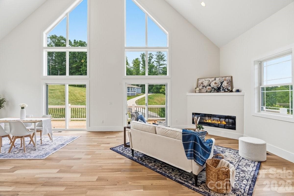 Big windows for natural light in open living area - Mars Hill