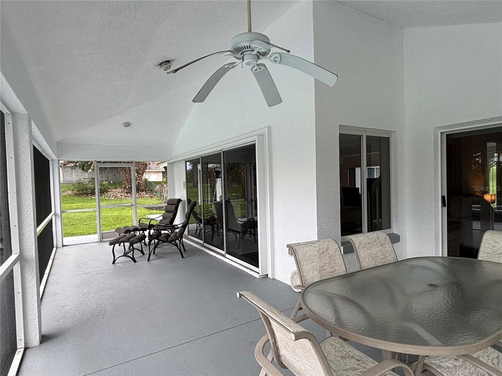 covered patio - 12853 BELLERIVE DR, CLERMONT