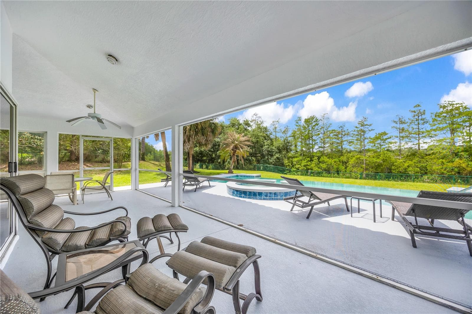 covered patio - 12853 BELLERIVE DR, CLERMONT