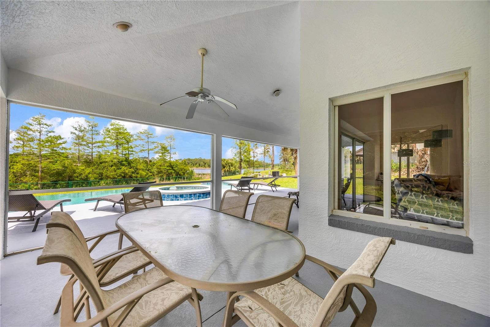 covered patio - 12853 BELLERIVE DR, CLERMONT