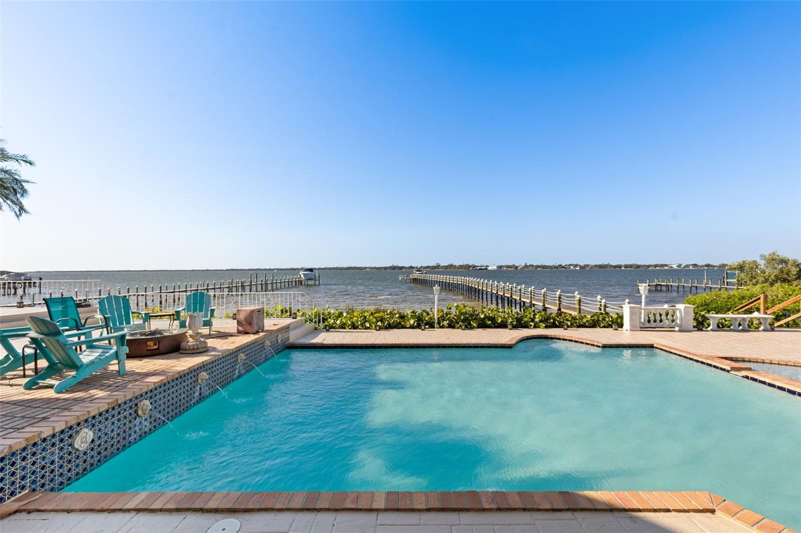 View over the pool to the Manatee River - 6118 RIVERVIEW BLVD, BRADENTON