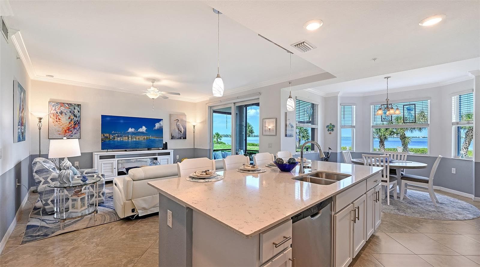 Open kitchen with Quartz island - 910 TIDEWATER SHORES LOOP #103, BRADENTON
