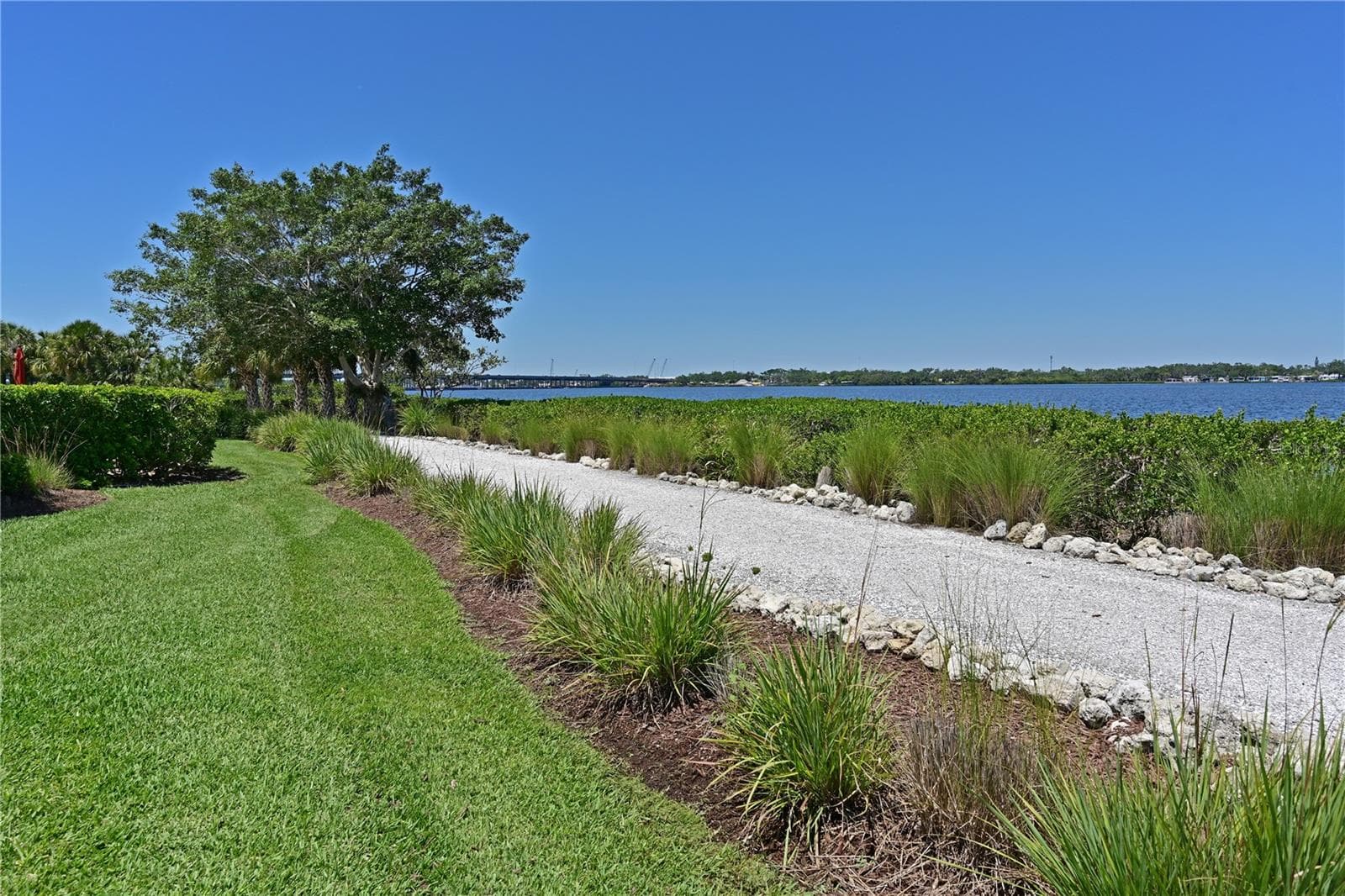 Walking path and sunset viewing seating - 910 TIDEWATER SHORES LOOP #103, BRADENTON