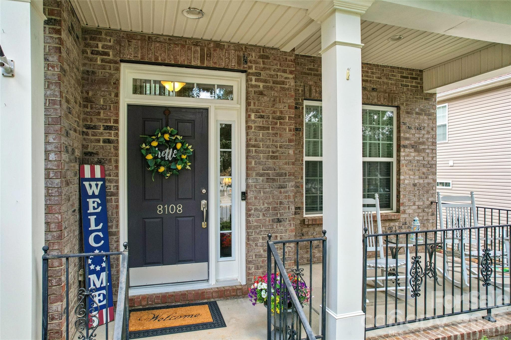 Welcoming front porch with extra space for rocking chairs - 8108 Penman Springs Drive, Waxhaw