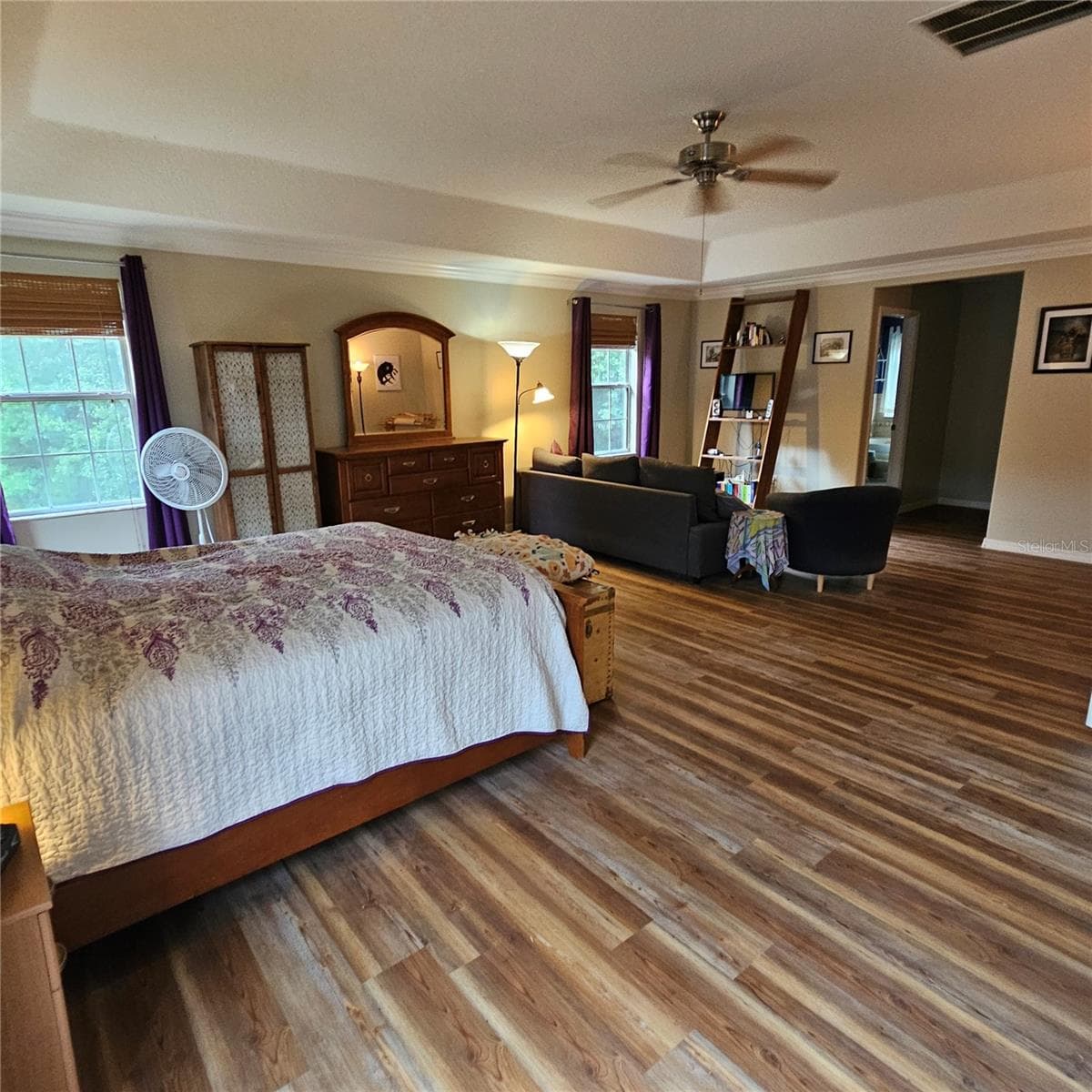 Primary Bedroom overlooks conservation backyard - 7306 BRIDGEVIEW DR, WESLEY CHAPEL