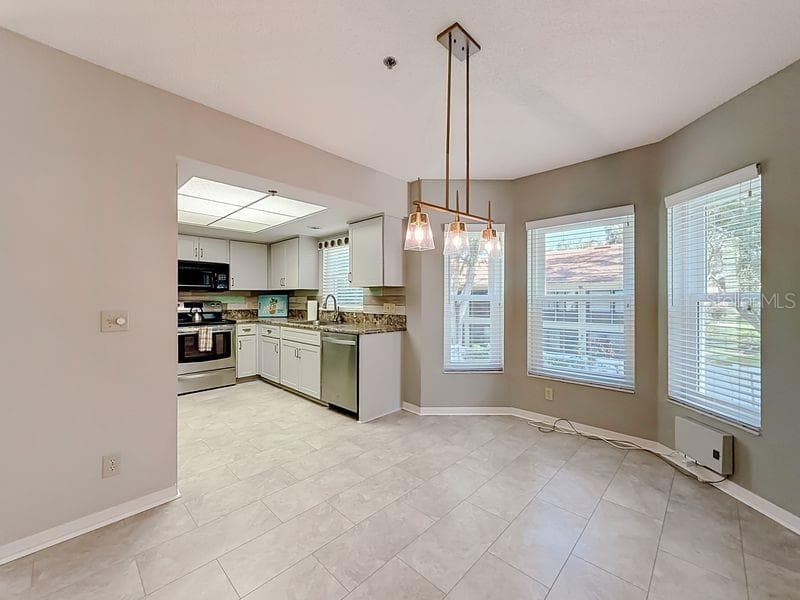 Conveniently located dining room - 2210 UTOPIAN DR E #214, CLEARWATER
