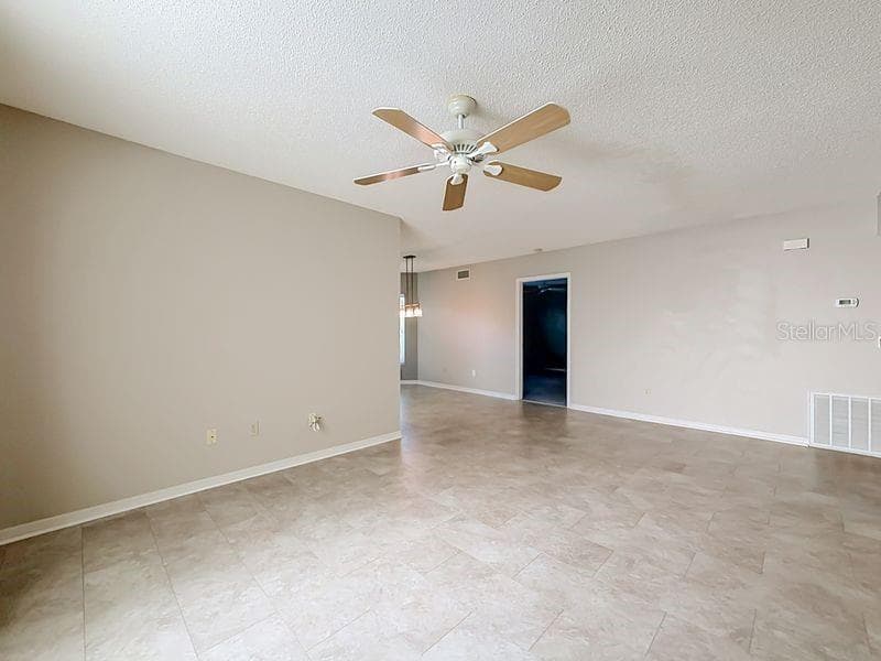 Bright and airy living room! - 2210 UTOPIAN DR E #214, CLEARWATER