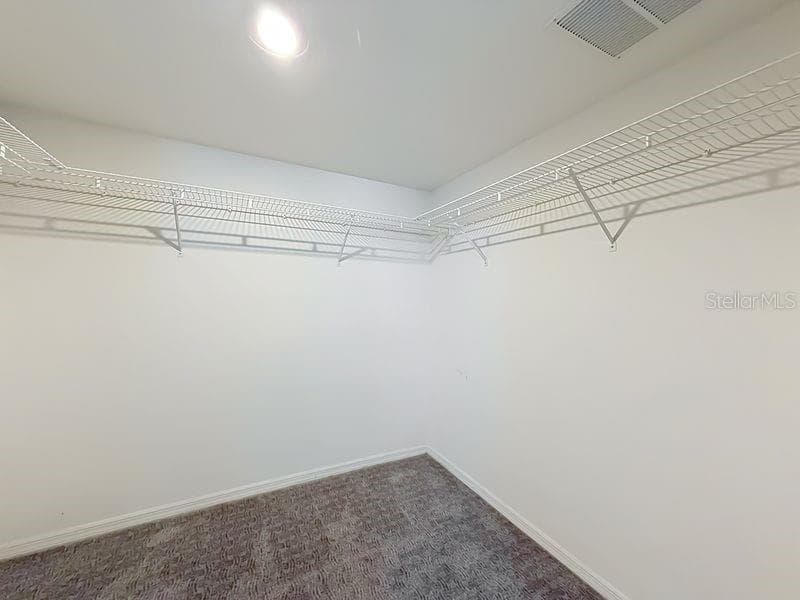 Primary walk-in closet - 2210 UTOPIAN DR E #214, CLEARWATER