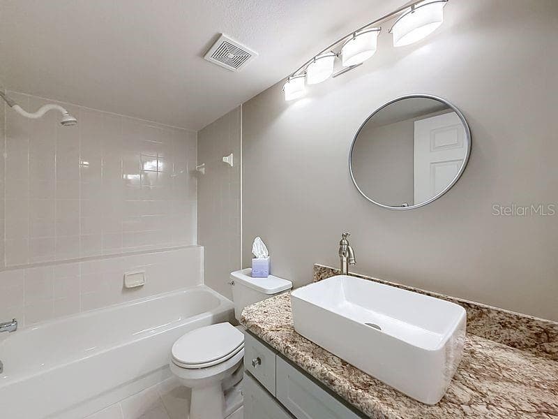 Guest bathroom just outside guest bedrooms - 2210 UTOPIAN DR E #214, CLEARWATER