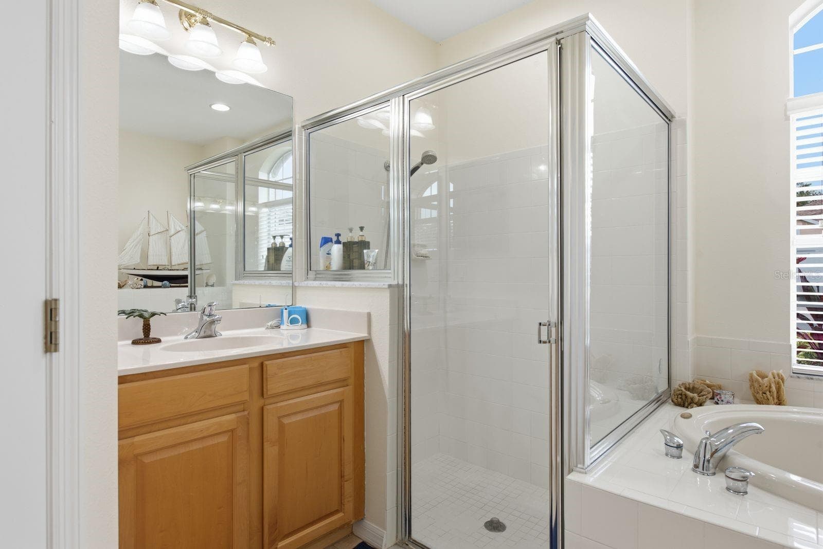 primary bathroom, shower, tub and water closet - 4882 W BREEZE CIR, PALM HARBOR