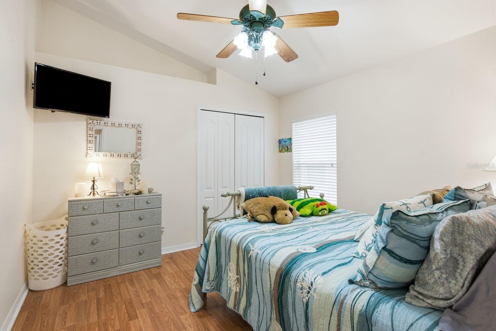 Bedroom 4 with access to exterior from hallway and bathroom - 4882 W BREEZE CIR, PALM HARBOR
