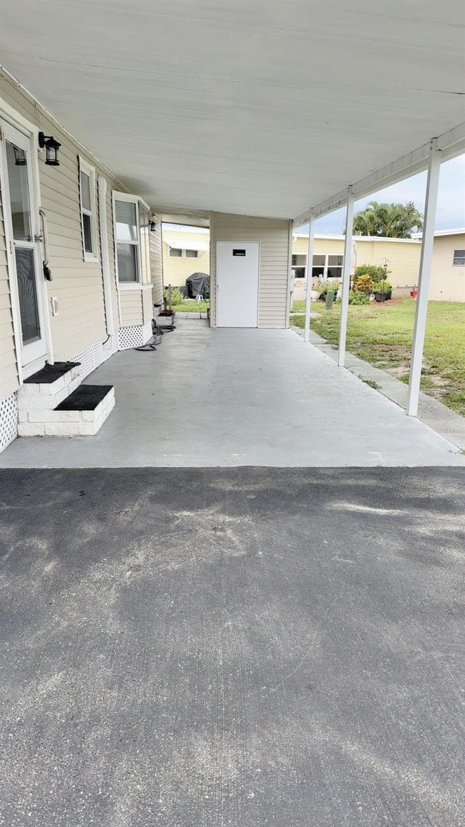 Long carport - 7173 MOUNT BRISTOL BLVD NE #458, ST PETERSBURG