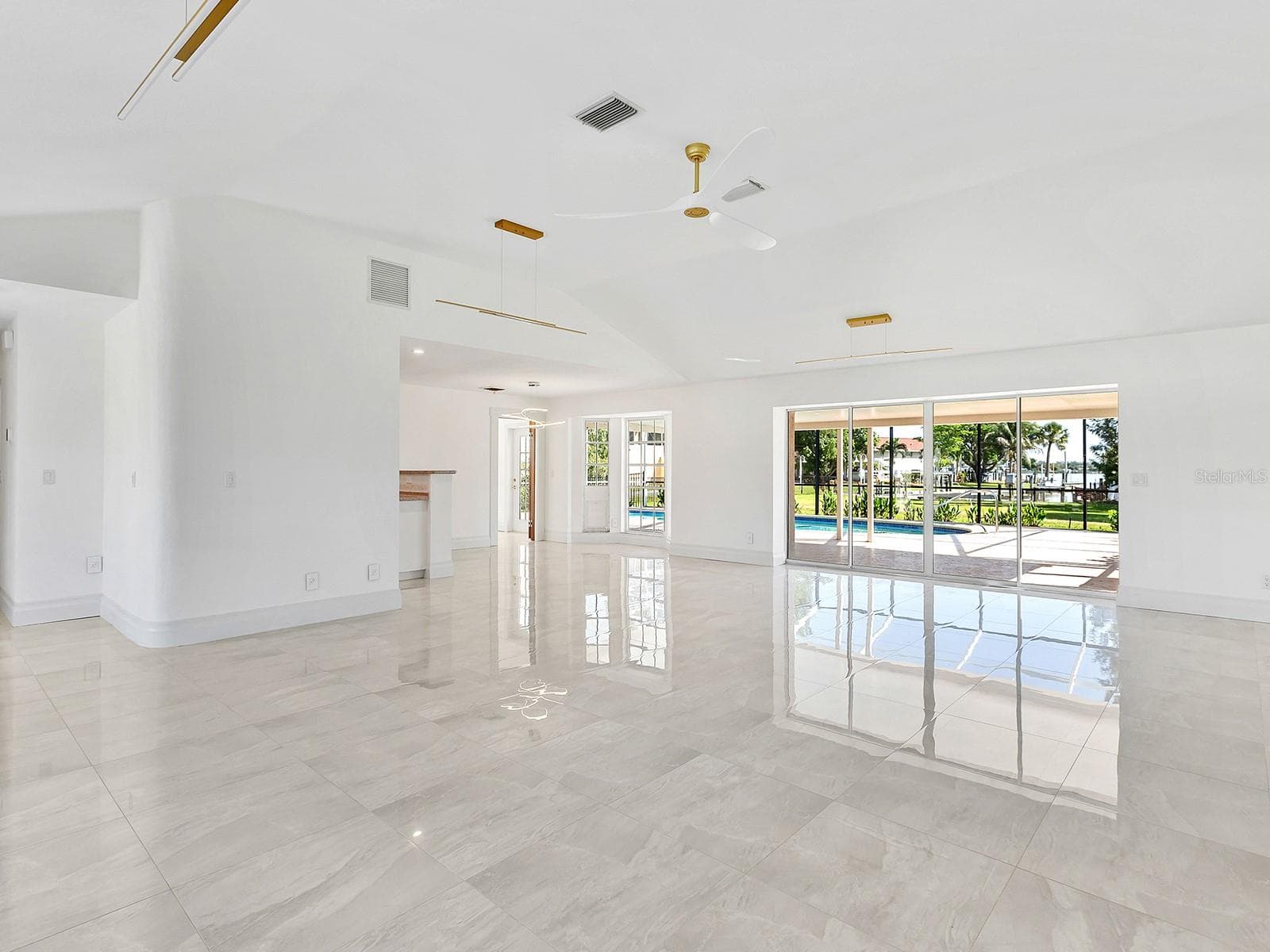 Open living, dining and kitchen - 396 BAYSHORE DR, VENICE