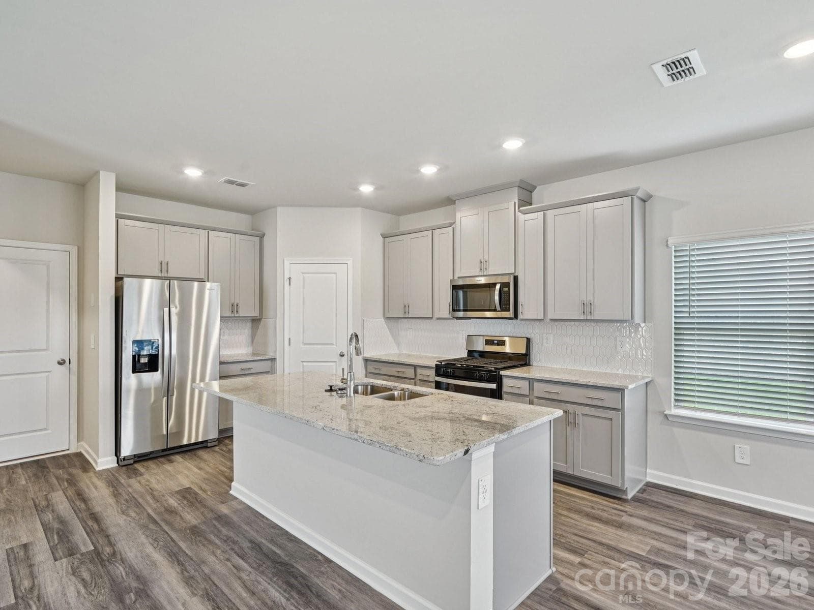 Photo is not of the actual home, but is an inspirational photo of builder’s model home and may depict options, furnishings, and/or decorator features that are not included - Gastonia