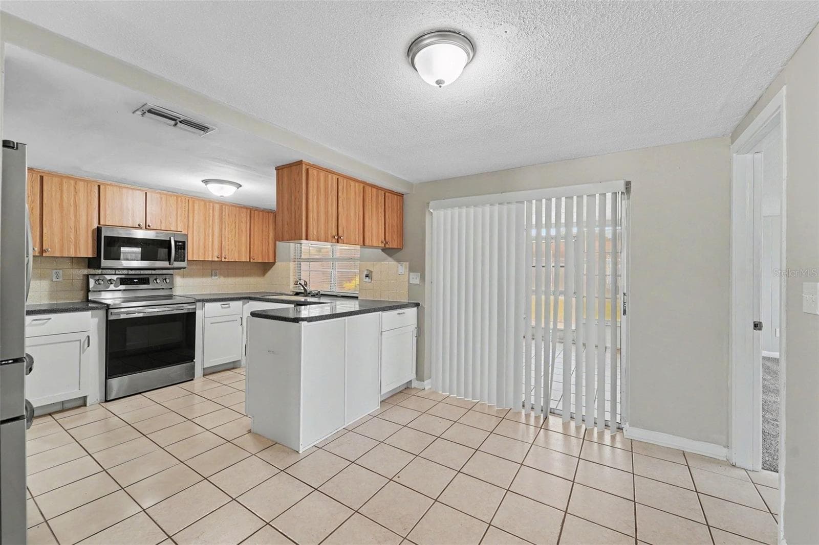 Single Family Residence at 7006 MAPLEHURST DR, PORT RICHEY, photo 10 of 19