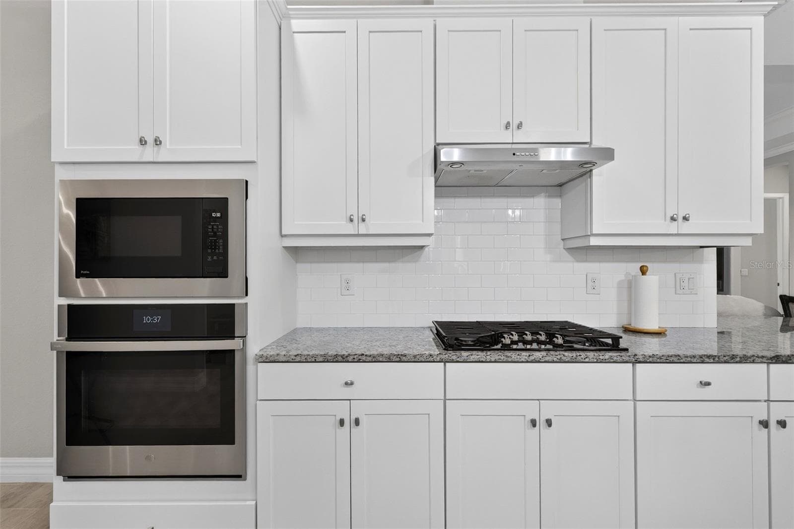 Kitchen Microwave, oven, gas stove, hood - 11825 PERENNIAL PL, BRADENTON