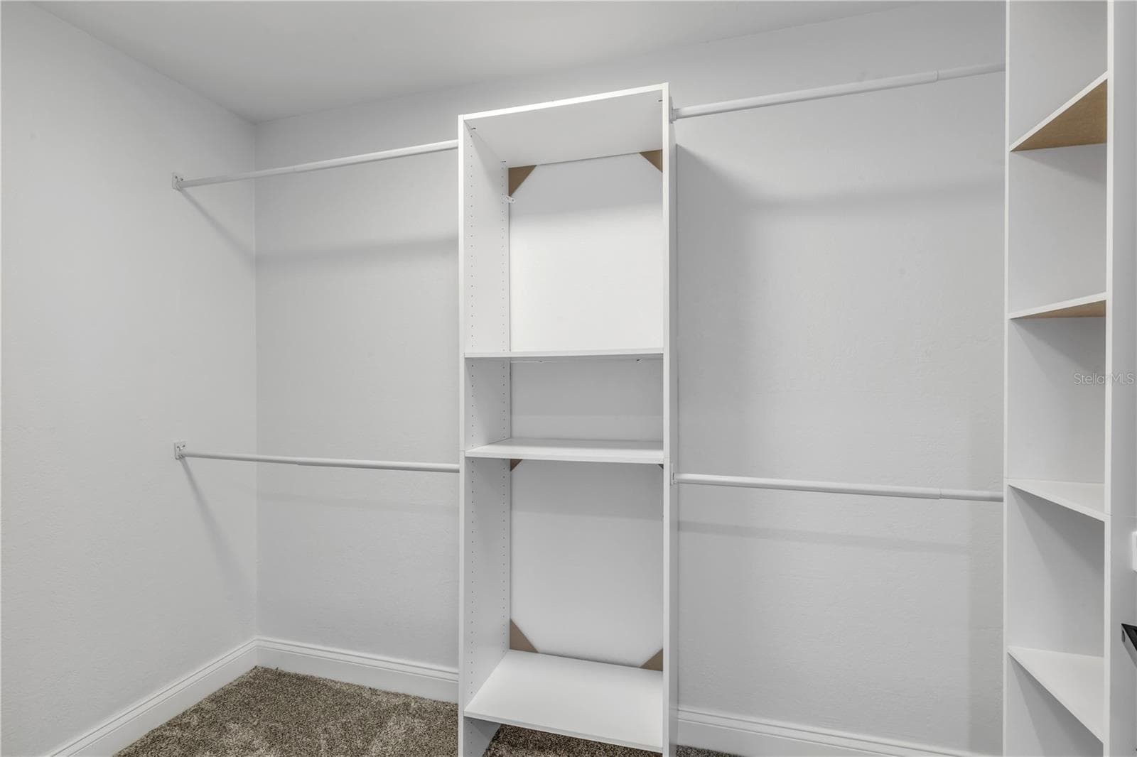 Primary Bedroom Walk-in closet - 265 MINORCA BEACH WAY #404, NEW SMYRNA BEACH