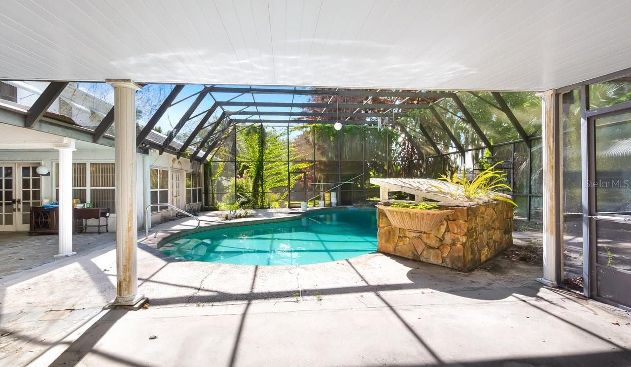 Pool with Cage and Lanai - 127 E LAUREL AVE, HOWEY IN THE HILLS