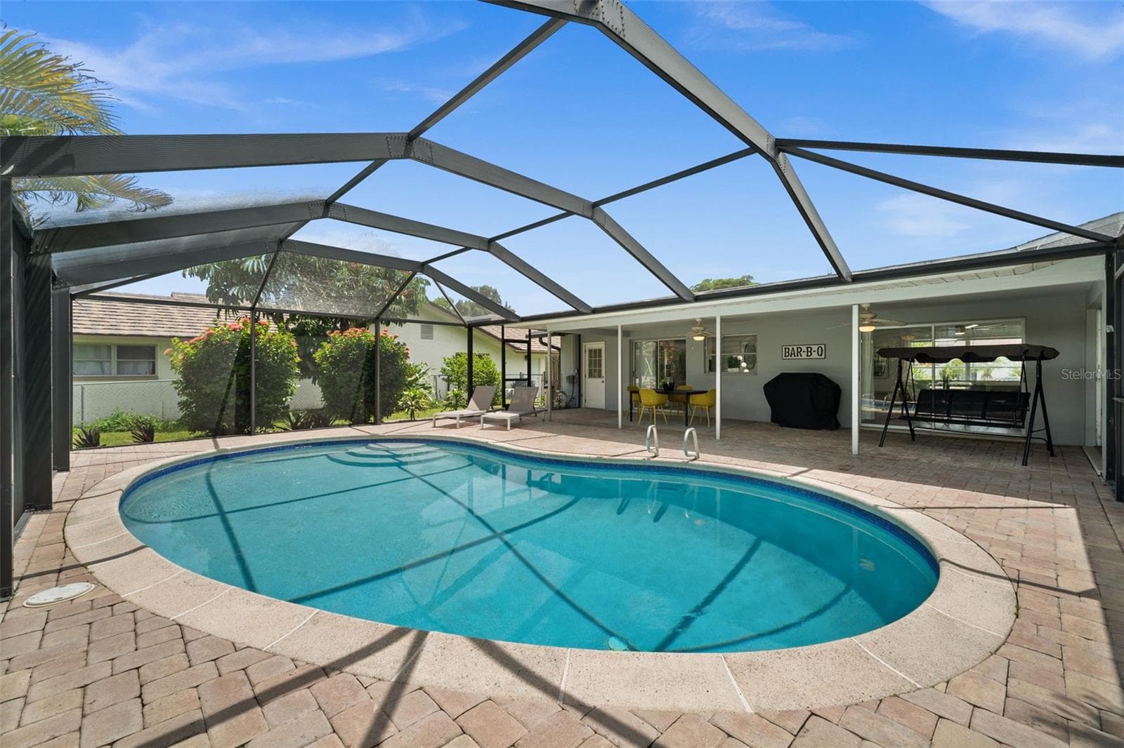 Pool surrounded by screen - 5122 SW 3RD AVE, CAPE CORAL