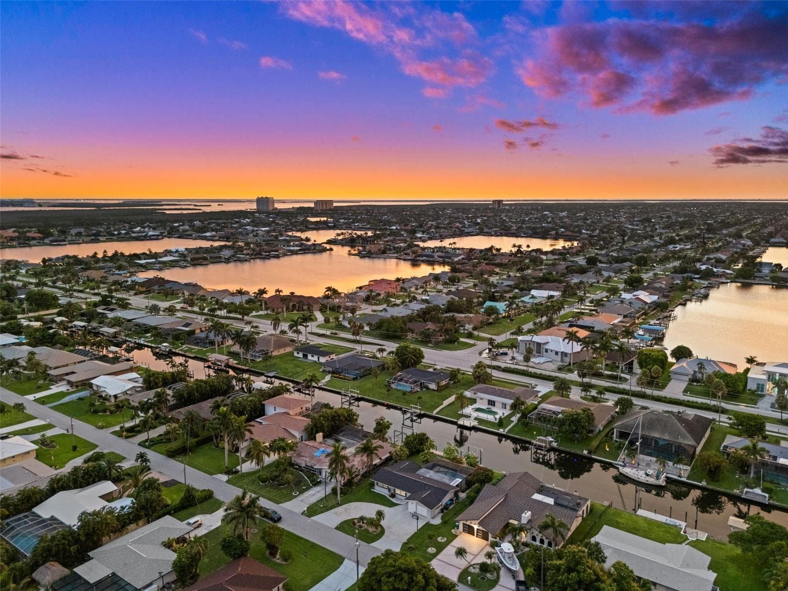 Evening Aerial View - 5122 SW 3RD AVE, CAPE CORAL