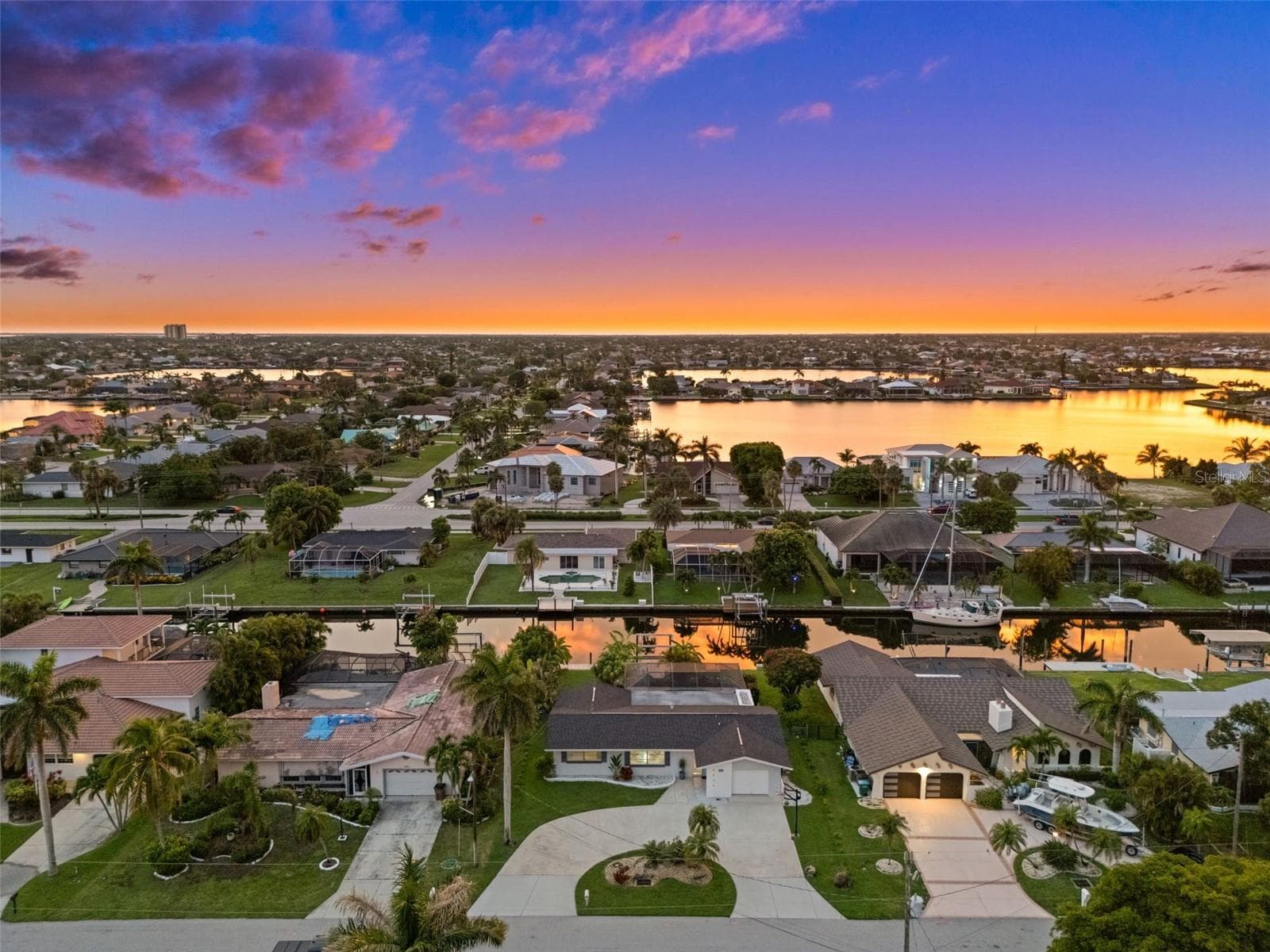 Aerial View in the Evening - 5122 SW 3RD AVE, CAPE CORAL
