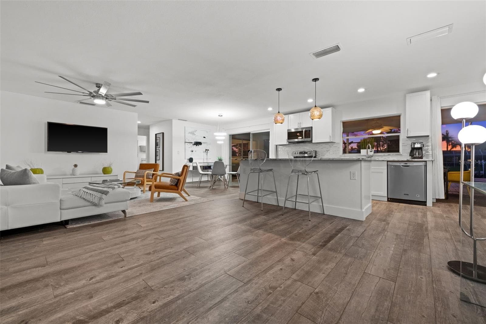 A view from inside in the evening. - 5122 SW 3RD AVE, CAPE CORAL