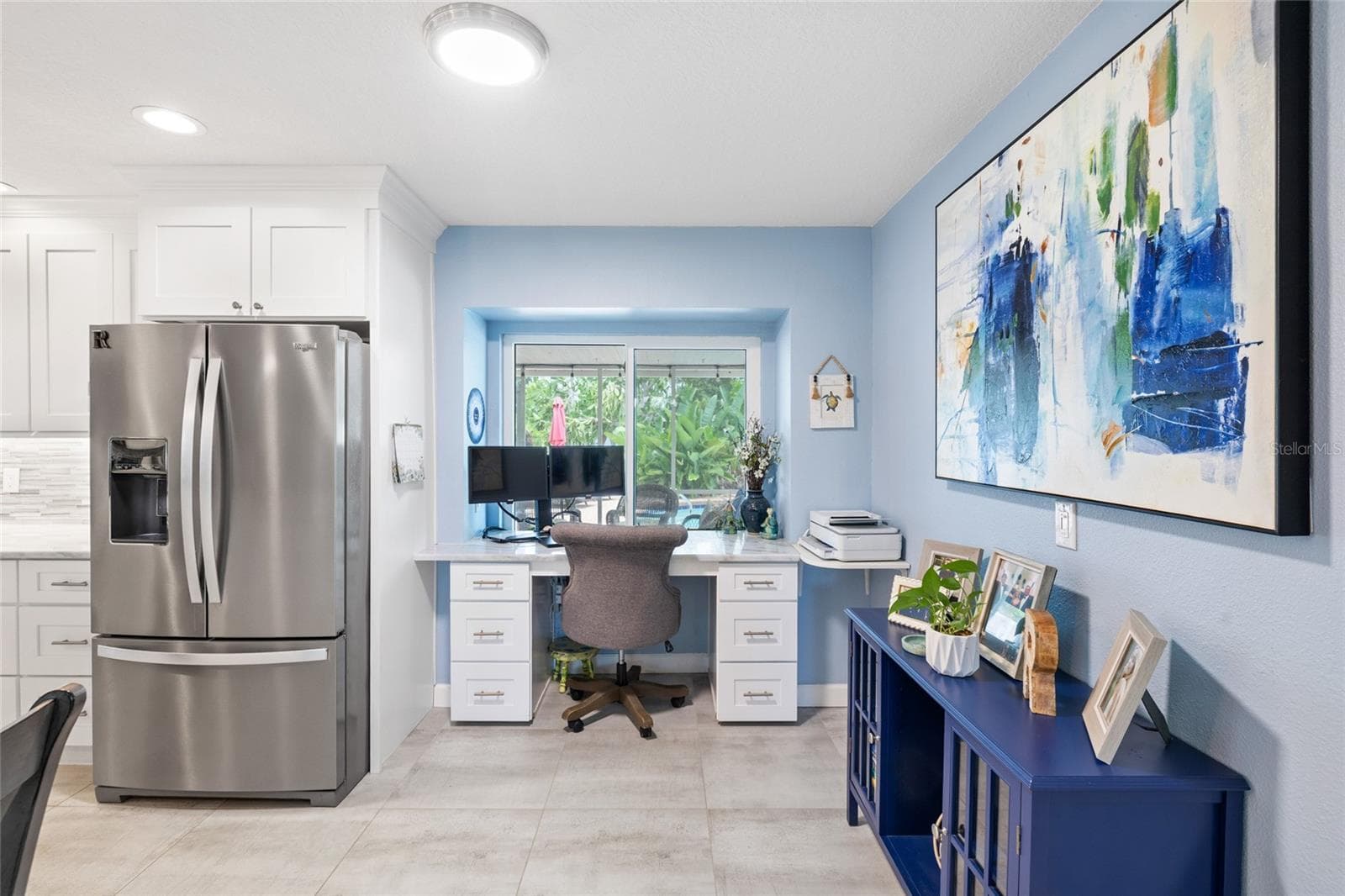 Built in Work Station overlooking the Enlosed Patio and the Pool - 1070 MCCARTY ST, DUNEDIN