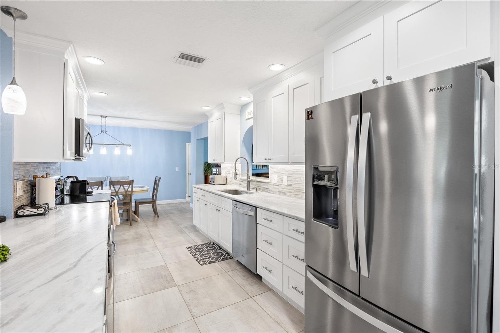 2021 Kitchen with Stainless appliances - 1070 MCCARTY ST, DUNEDIN