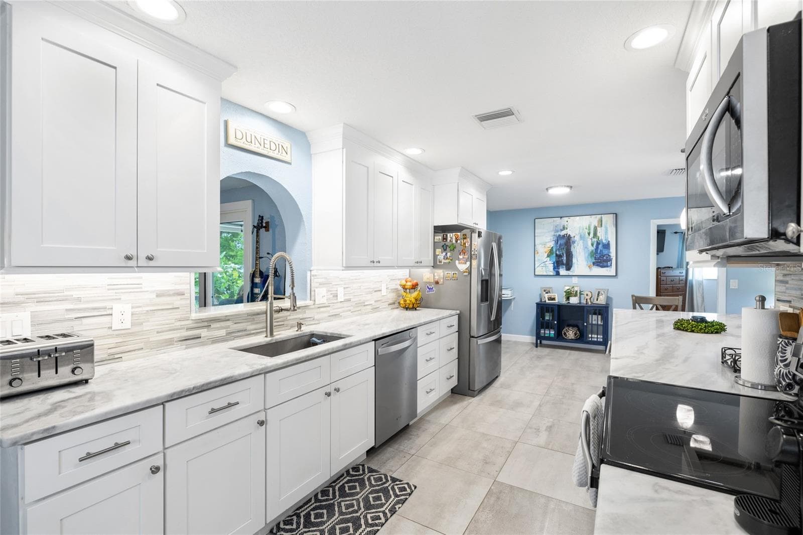 Kitchen with Marble Countertops - 1070 MCCARTY ST, DUNEDIN