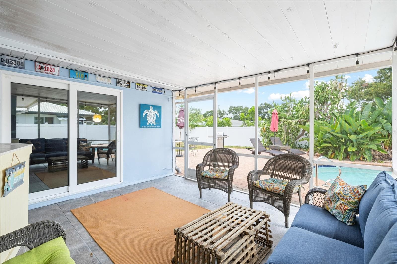 Enlosed Rear Patio overlooking the Pool - 1070 MCCARTY ST, DUNEDIN