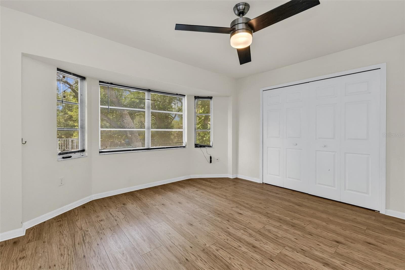 Third bedroom with closet, french entry doors, and private lanai walkout with sliders, or make this an office/exercise room/or den with closet! Plenty of space, create away! - 297 FLAMINGO BLVD, PORT CHARLOTTE